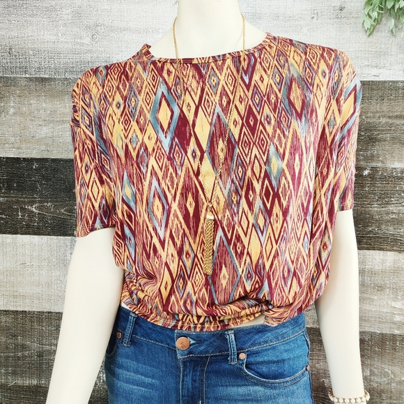 LuLaRoe Tops - Lulroe gold wine geometric Carly top